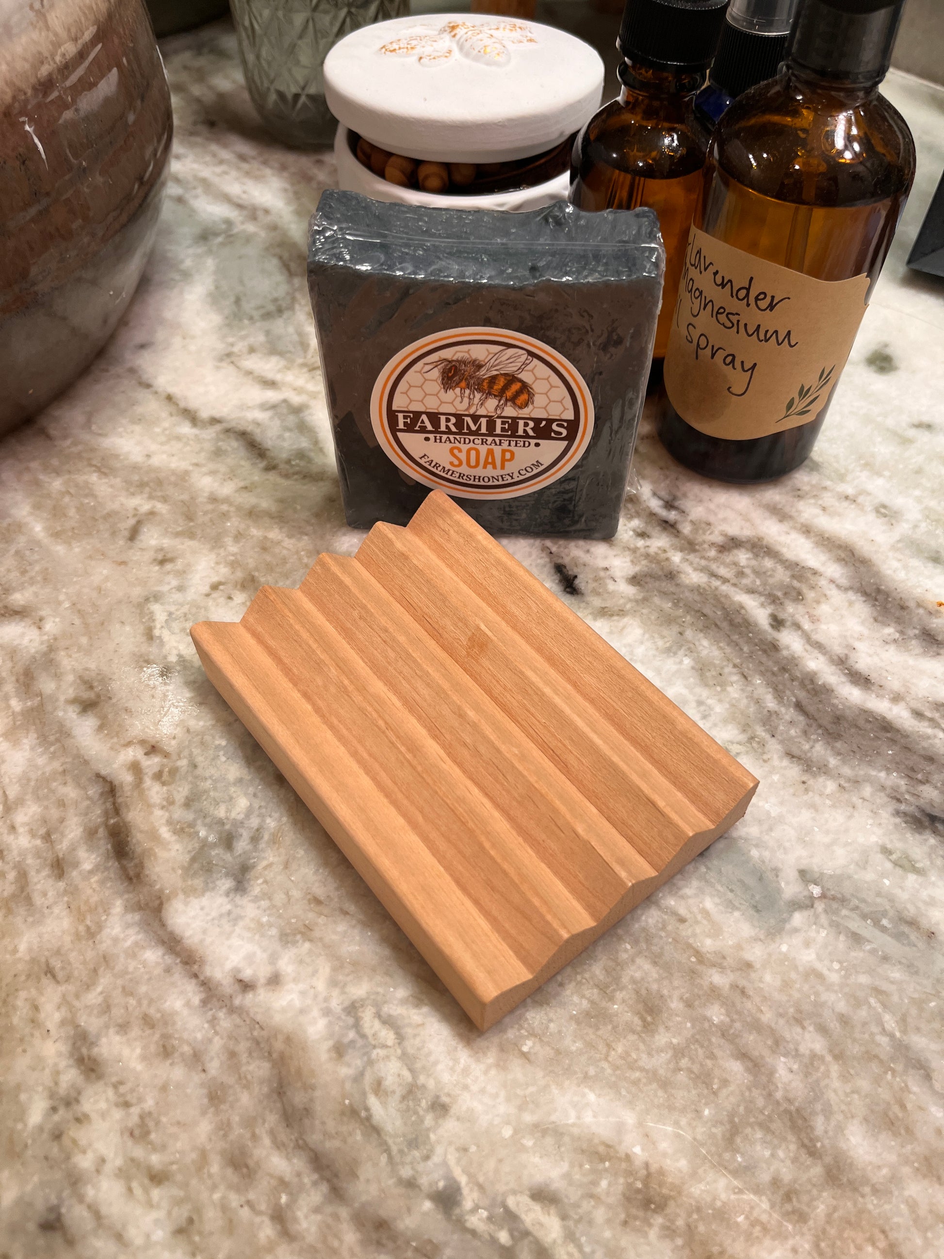 wooden soap saver on a counter